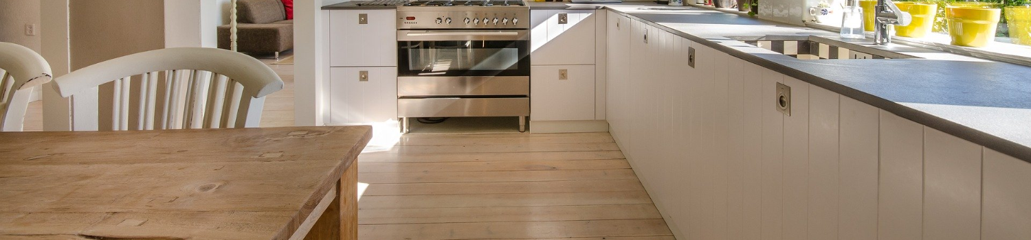Image of laminate flooring in kitchen with sunset lighting